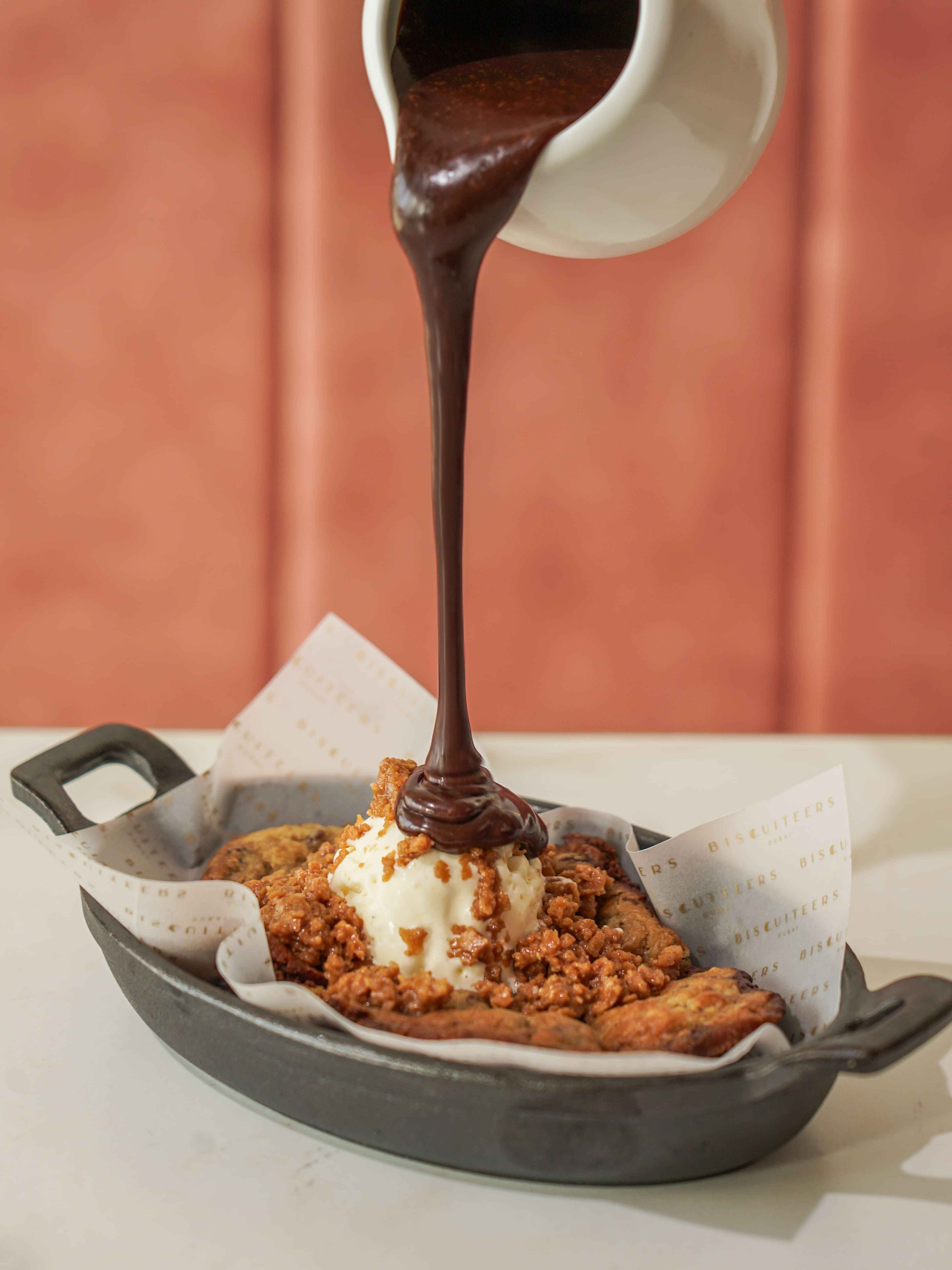 Freshly Baked Soft Chocolate Chip Cookie With Creamy Vanilla Ice Cream