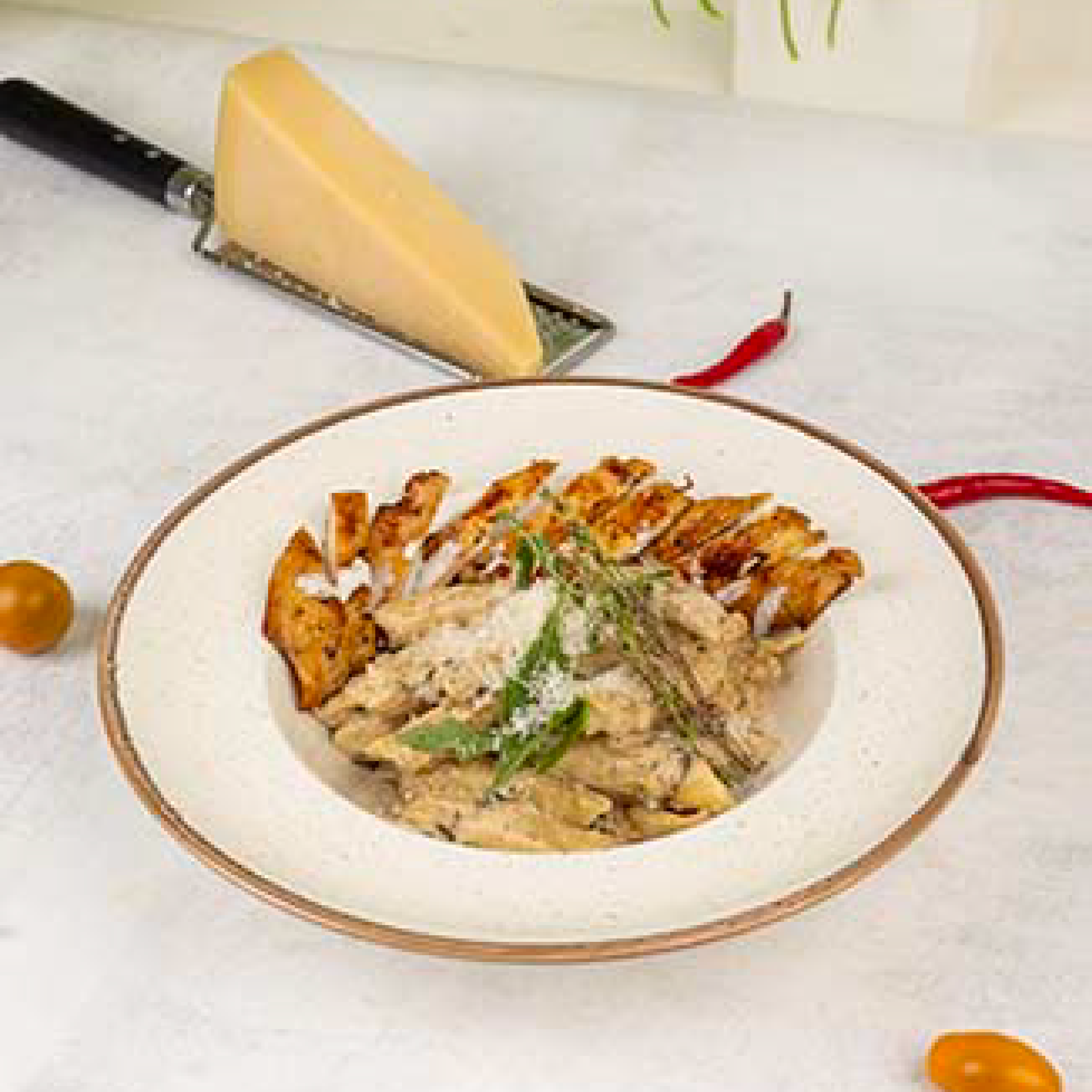 PENNE WHITE SAUCE WITH CHEESE WHEEL